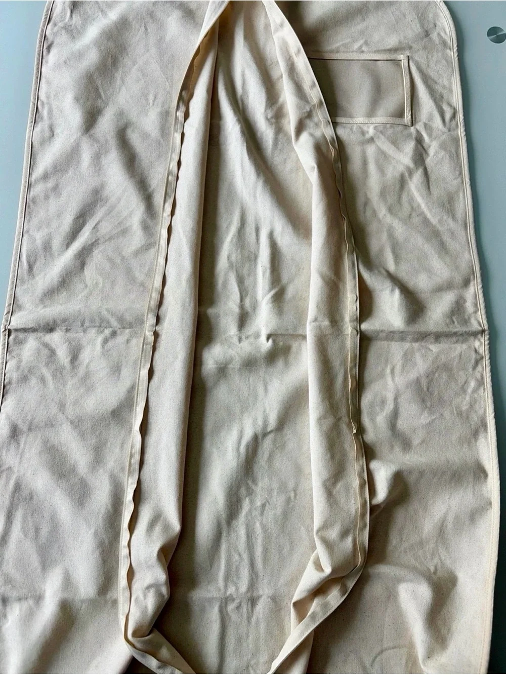 Cult Gaia Canvas Garment Cover in Beige with Red Logo 50”x 24”